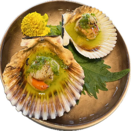 Zamburiñas a la planta en salsa de ajo y perejil